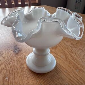 Fenton Silver Crest milk glass pedestal bowl with a ruffled rim.